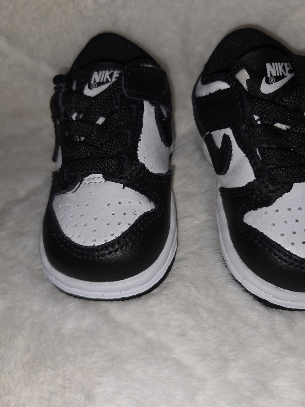 black and white Nike Dunk Low toddler shoes